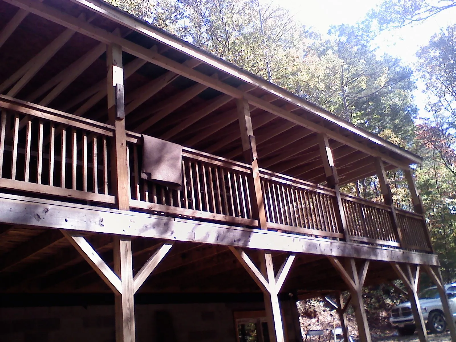 Timber framing under a new elevated porch and deck — Roof Leak Repair in Schoolcraft by Roofing Brothers